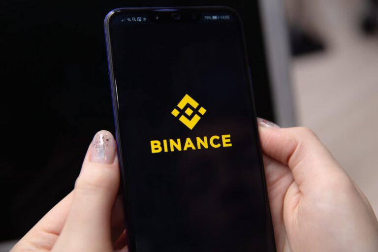 binance logo on iphone smartphone